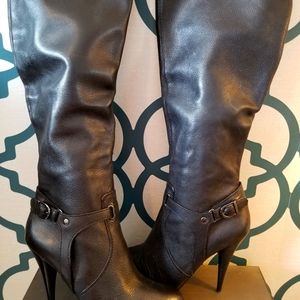 Tall leather black boots
